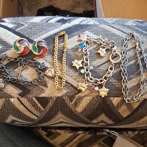 Accessory Collection with Colorful Earrings and Charm Bracelets